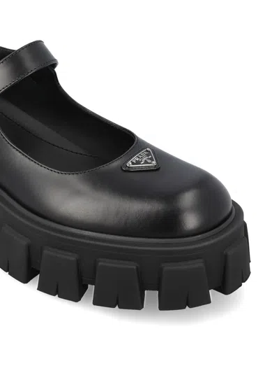 Prada Leather Logo Plaque Platform Flats In Black