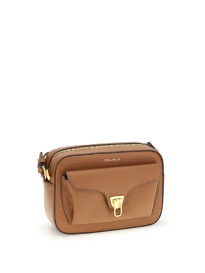 Coccinelle Textured Leather Crossbody Bag In Brown