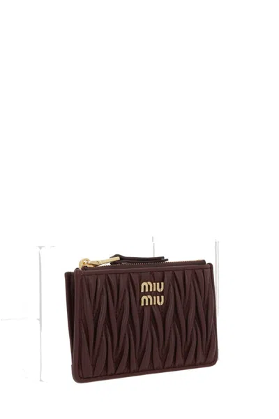 Miu Miu Quilted Zip Wallet In Brown