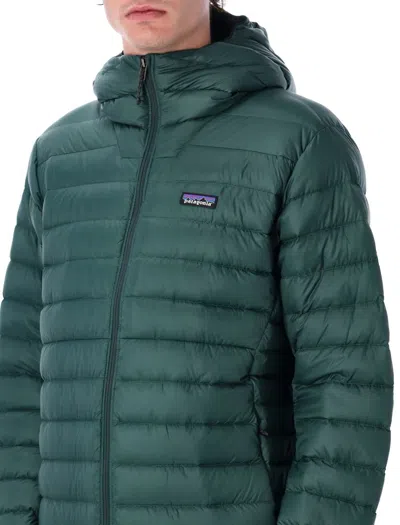 Patagonia Insulated Hoodie Featuring Adjustable Elements In Green