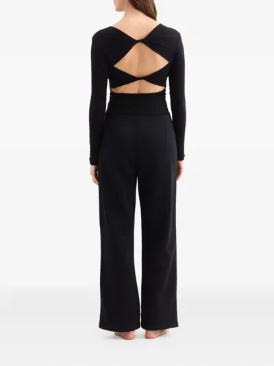 Eres Long-sleeve Twist-back Top In Black