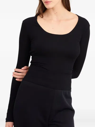 Eres Long-sleeve Twist-back Top In Black