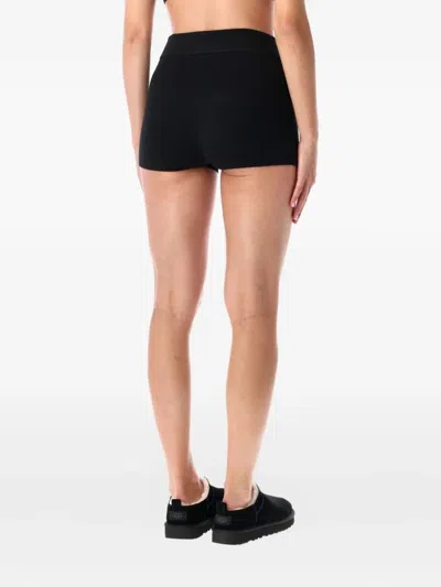 Essentials Embossed Logo Knit Shorts In Black