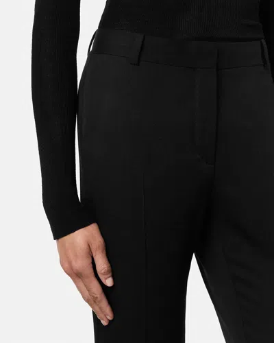Versace Flared-leg Trousers In Black