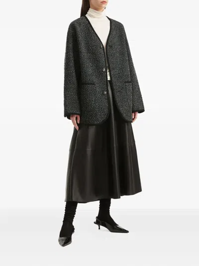 仿羔皮呢搭扣夹克