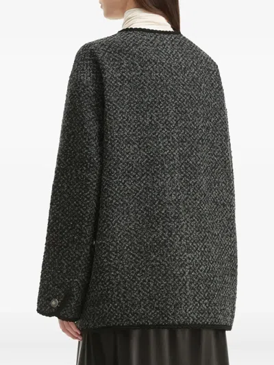 仿羔皮呢搭扣夹克