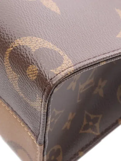 Pre-owned Louis Vuitton 2010s On The Go Pm Monogram-reverse Tote Bag In Brown