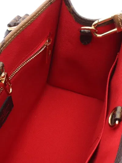 Pre-owned Louis Vuitton 2010s On The Go Pm Monogram-reverse Tote Bag In Brown