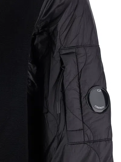 C.p. Company Men Black Jacket With Drawstring Hood And Logo Plaque On The Sleeve In Wool Man In Black