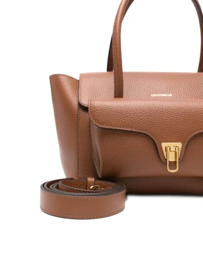 Coccinelle Structured Calfskin Shopper Bag With Gold-tone Accents In Brown