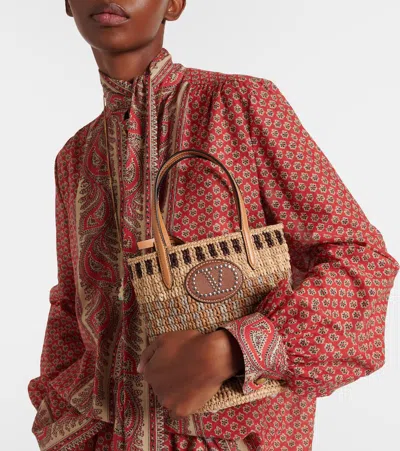 Valentino Garavani Small Vlogo Signature Crocheted Raffia Bucket Bag In Brown