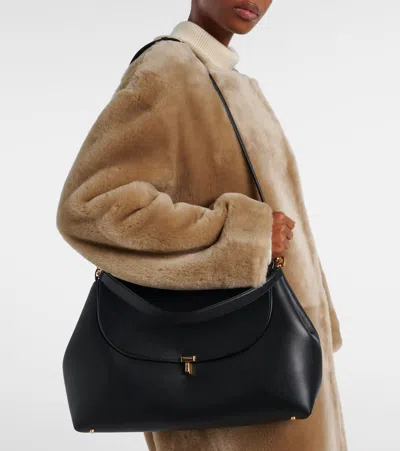 Totême T-lock Foldover Top Shoulder Bag In Black
