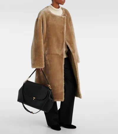Totême T-lock Foldover Top Shoulder Bag In Black