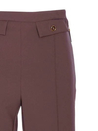 Elisabetta Franchi High-waisted Flared Pants With Decorative Button Details In Red