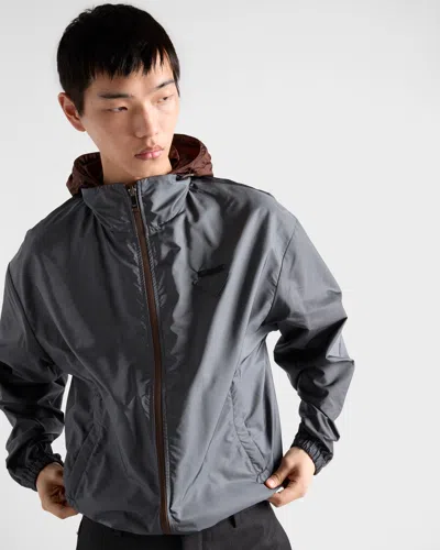 Prada Reversible Re-nylon Jacket In Brown
