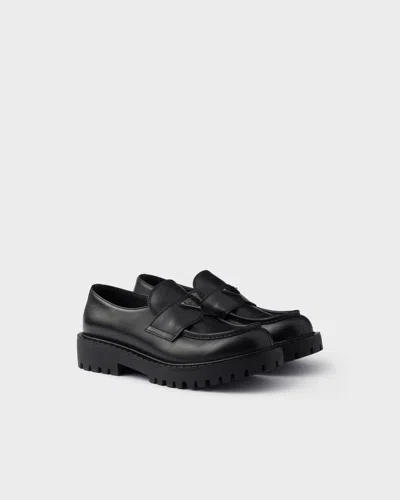 Prada Monolith Leather Loafers In Black