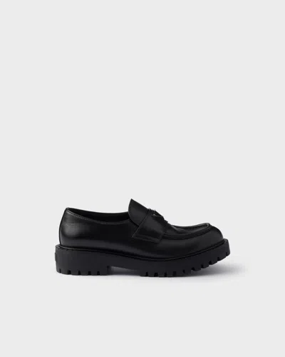 Prada Monolith Leather Loafers In Black