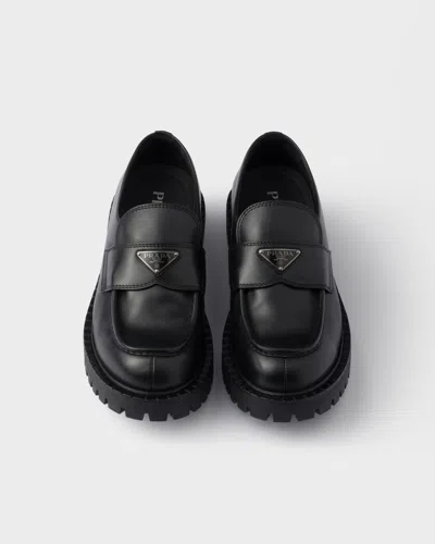 Prada Monolith Leather Loafers In Black