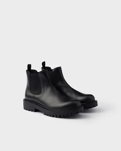 Prada Elastic-gusset Leather Boots In Black