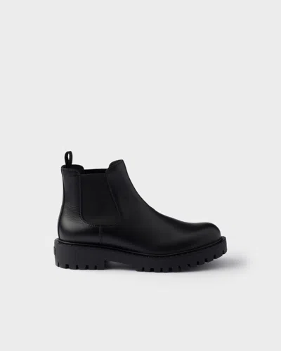Prada Elastic-gusset Leather Boots In Black