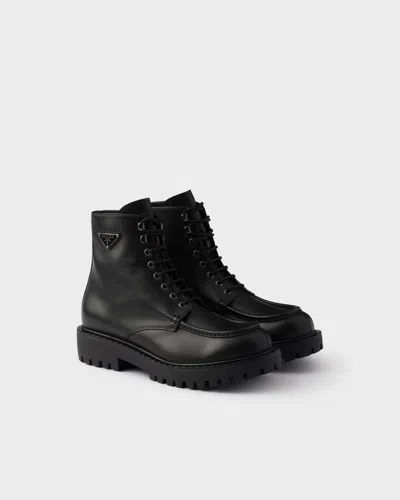 Prada Laced Leather Booties In Black
