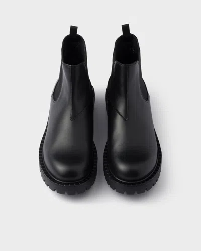 Prada Elastic-gusset Leather Boots In Black