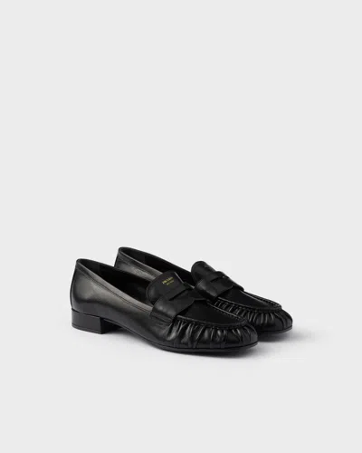 Prada Rounded Toe Loafers With Textured Detailing And Low Block Heel In Black