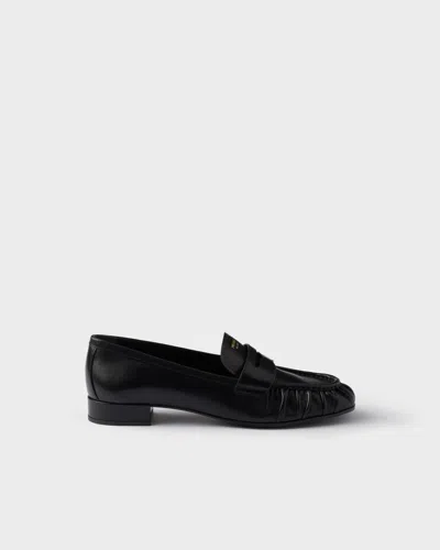Prada Rounded Toe Loafers With Textured Detailing And Low Block Heel In Black