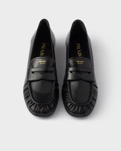Prada Rounded Toe Loafers With Textured Detailing And Low Block Heel In Black