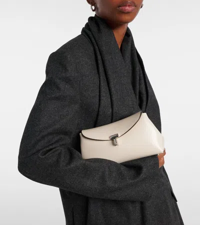 Totême T-lock Grained-leather Clutch Milk In White