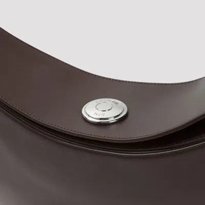 Jacquemus Le Calisso Rond Large Brown Shoulder Bag With Adjustable Strap And Embossed Logo In Leathe In Brown
