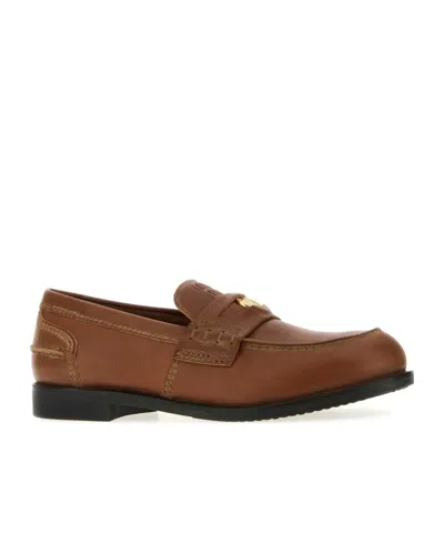 Miu Miu Round Toe Leather Loafers With Stitch Detail In Brown