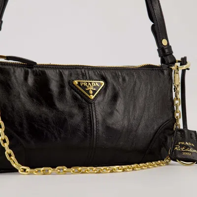 Prada Re-edition 2002 Medium Shiny Finish Leather Shoulder Bags In Black