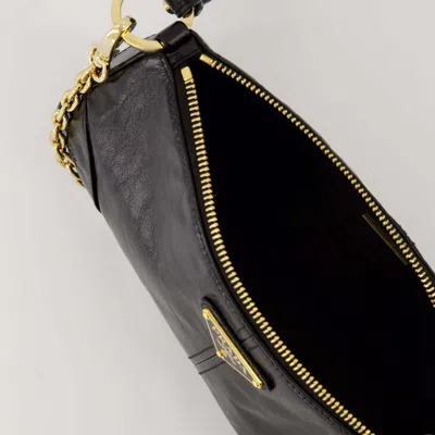 Prada Re-edition 2002 Medium Shiny Finish Leather Shoulder Bags In Black