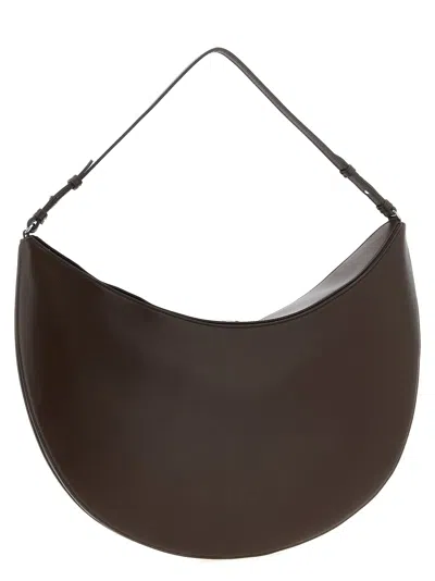 Jacquemus Le Calisso Rond Large Brown Shoulder Bag With Adjustable Strap And Embossed Logo In Leathe In Brown