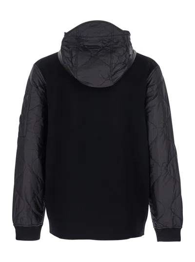 C.p. Company Men Black Jacket With Drawstring Hood And Logo Plaque On The Sleeve In Wool Man In Black