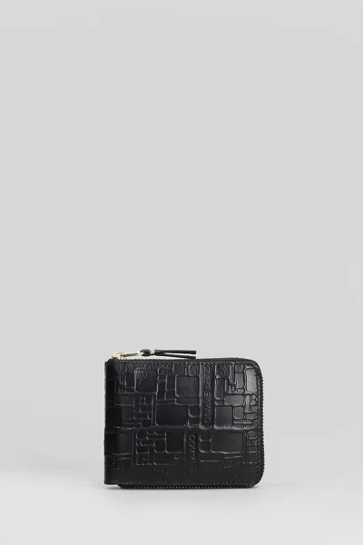 Comme Des Garçons Embossed Logotype Wallet In Black