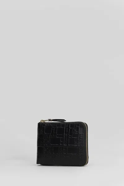 Comme Des Garçons Embossed Logotype Wallet In Black