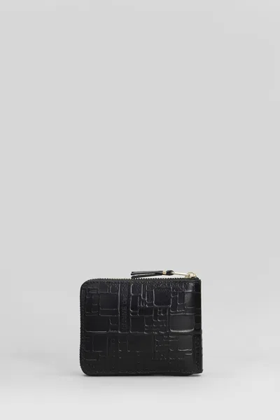 Comme Des Garçons Embossed Logotype Wallet In Black