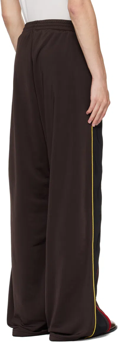 Martine Rose Wide-leg Casual Pants With Contrasting Side Stripes In Burgundy
