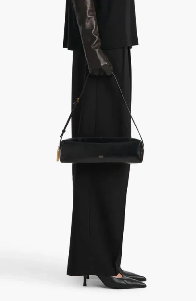 Khaite Kye Glossed-leather Shoulder Bag In Black