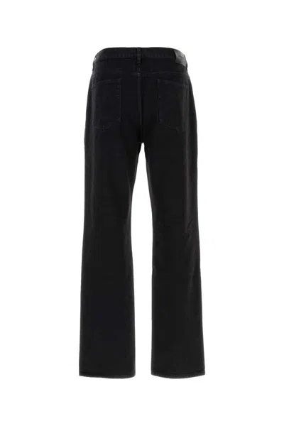 Saint Laurent Classic-five Pockets Logo-patch Jeans In Black