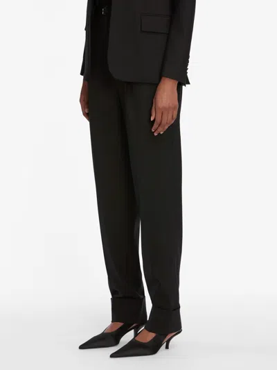 Frame The Cuffed Pleated Trouser Pants In Black