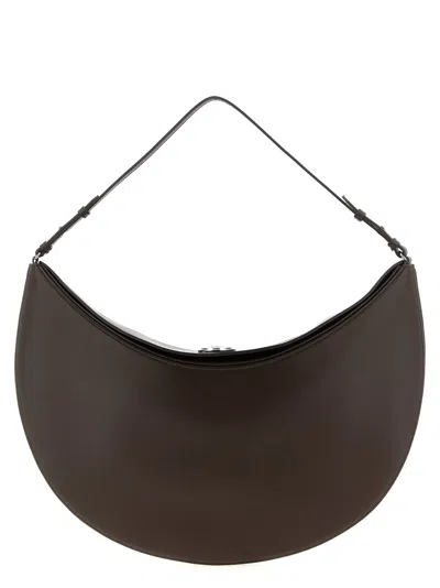Jacquemus Le Calisso Rond Large Brown Shoulder Bag With Adjustable Strap And Embossed Logo In Leathe In Brown