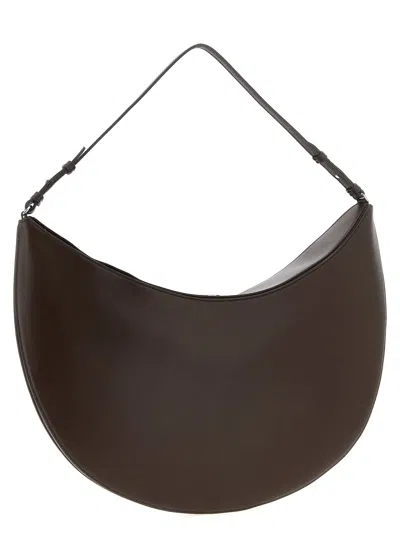Jacquemus Le Calisso Rond Large Brown Shoulder Bag With Adjustable Strap And Embossed Logo In Leathe In Brown