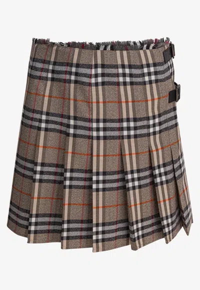 Burberry Plaid Pleated Skirt With Frayed Hem And Buckle Accents In Brown