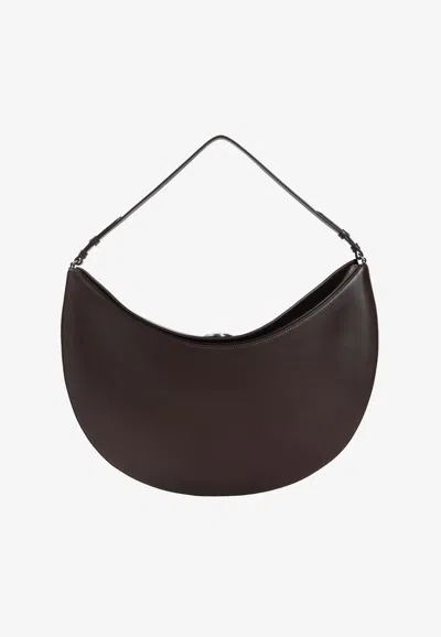 Jacquemus Le Calisso Rond Large Brown Shoulder Bag With Adjustable Strap And Embossed Logo In Leathe In Brown