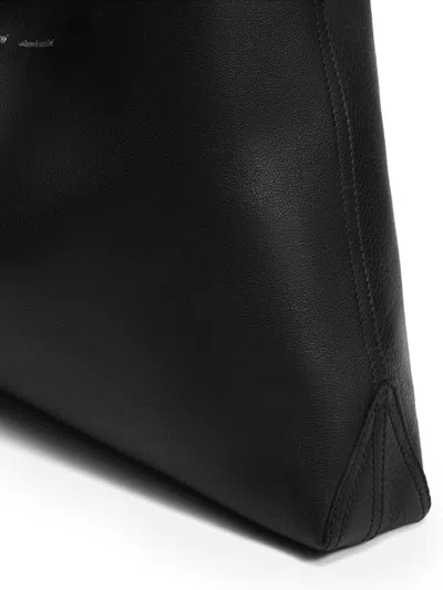 Ami Alexandre Mattiussi Etienne Leather Trapezoid Shoulder Bag In Black