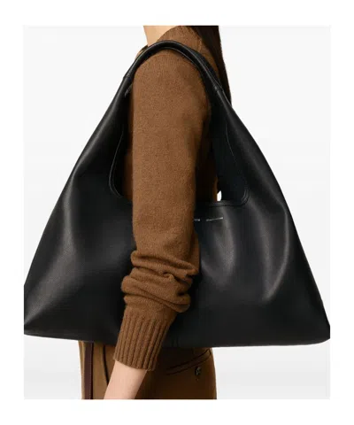 Ami Alexandre Mattiussi Etienne Leather Trapezoid Shoulder Bag In Black