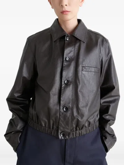Lemaire Buttoned-up Elasticated Leather Jacket In Burgundy